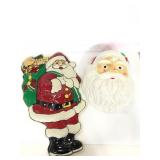 Two plastic Santa Claus molds decorations