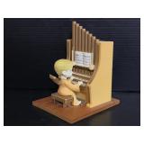 The Merton Co. 1982 musical organ figure