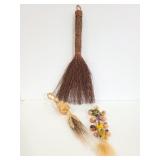 Three decorative small broom art