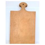 Wood cutting board with handle