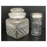 Two glass jars with lids