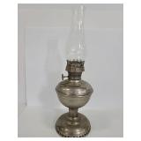 Vintage metal oil lamp with glass shade