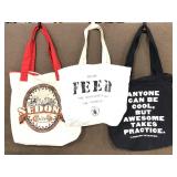 Three assorted canvas tote bags
