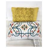 Two rectangular polyester throw pillows