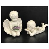 Two white angel ceramic decor pieces