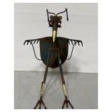 Re-tooled metal bird yard art sculpture