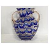 Pink glass handles vase w/ blue swirl design