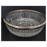 Cut glass serving bowl with metal rim