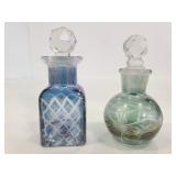 Two small etched glass bottles w/ stoppers