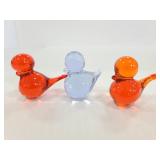 Three tiny glass birds
