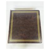 Vintage leather scrapbook full of pictures