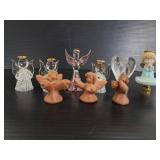 Glass, clay, and resin small angel figurines
