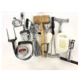Small basket of assorted kitchen utensils