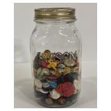 Vintage glass mason jar of old buttons