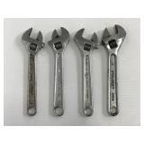 Four Crescent wrenches