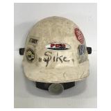 White plastic workers helmet