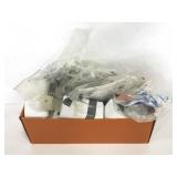 Small box of assorted work supplies