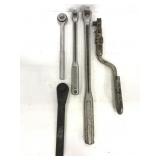 Two Craftsman breaker bars and ratcheting wrenches