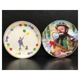 Two decorative clown plates