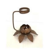 Copper toned flower candle stick holder