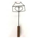 Metal and wooden vintage rug beater