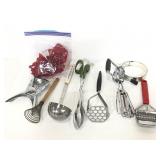Eight vintage kitchen utensils plus cookie cutters