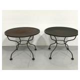 Pair of matching round metal patio side tables