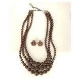 Vintage three strand beaded necklace and earrings