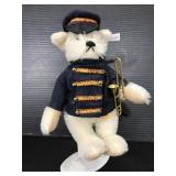 Strife dog in band uniform with stand