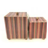 Two striped square containers with gold accents