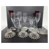 Glass flutes, shade, frame and candlesticks