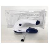 New in open package Evercare fabric shaver