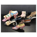 Collection of nine shoe figurines