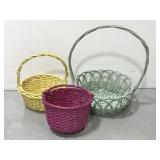 Trio of pastel colored woven wicker baskets