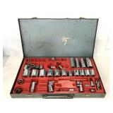 Collection of assorted bolts in vintage metal case