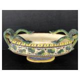 Pottery made signed oval shaped snake dish