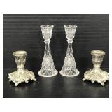 Glass and cast metal candlestick holders