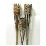 Three bamboo wood tiki torches
