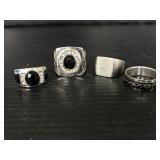 Black and silver tone rings