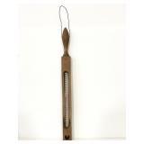 Folk art wood enclosed thermometer