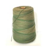 Large spool of green string