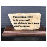 Glazed stone on wooden platform desk sign