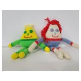 Two crocheted monsters