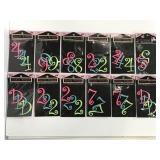 Twelve new packs of embroidered monogram letters