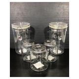 Three new glass jars and two new canisters