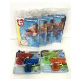 Four new packs of water armbands & 4 water guns