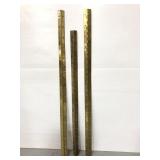 Three gold toned long hinges