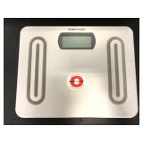 Silver colored Health O Meter weight scale