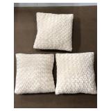 Three matching white fleece throw pillows #1