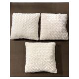 Three matching white fleece like throw pillows #2